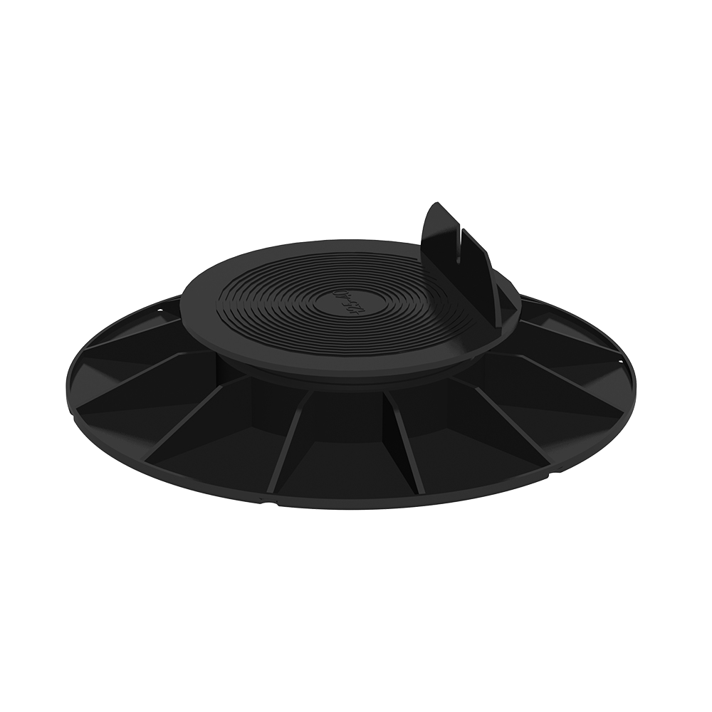 Socle circulaire en plastique noir avec centre nervuré surélevé et ailette verticale, diamètre estimé 10 cm, posé sur fond blanc. Référence non visible.